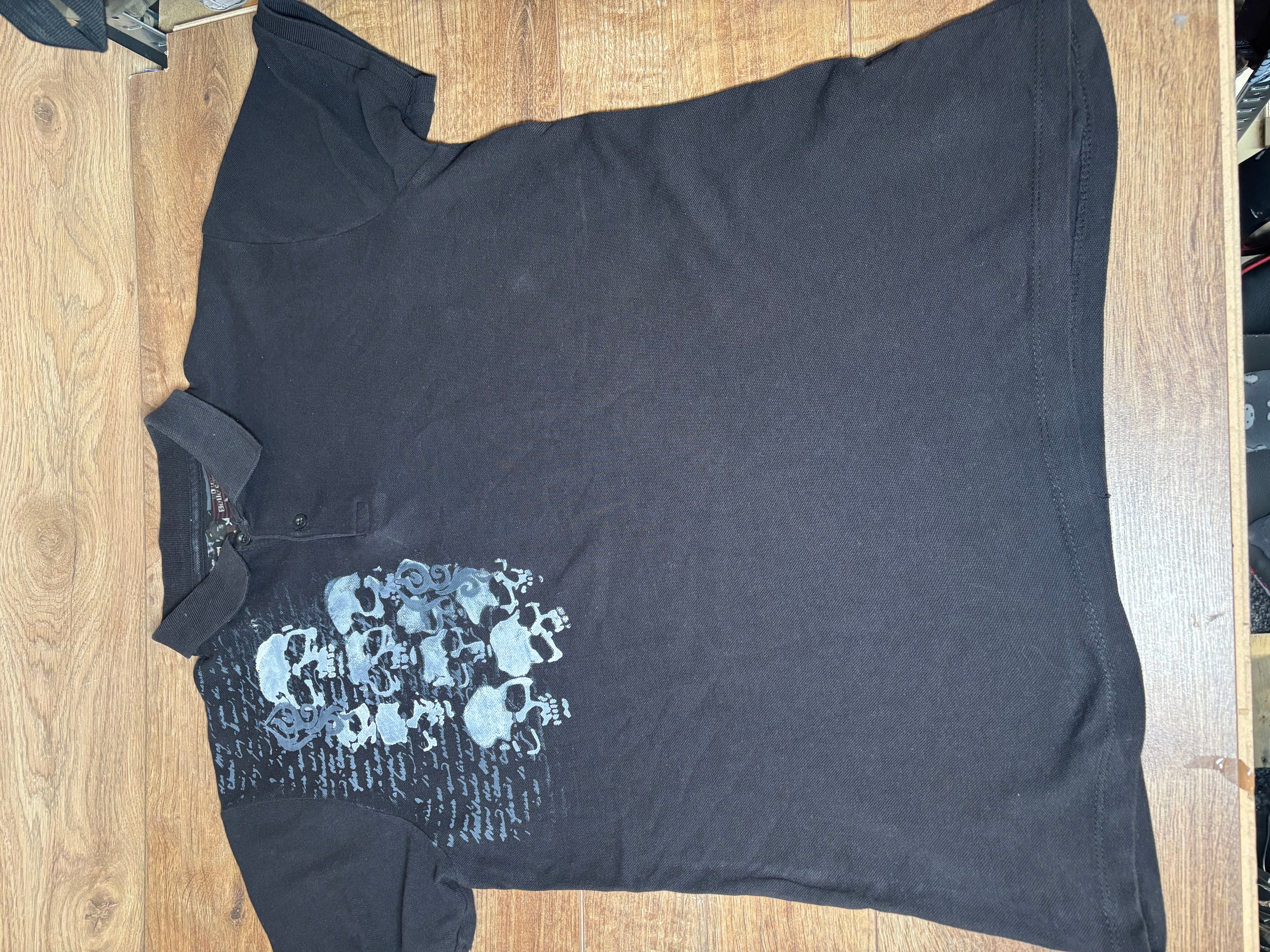 Skater style black and gray printed skull polo