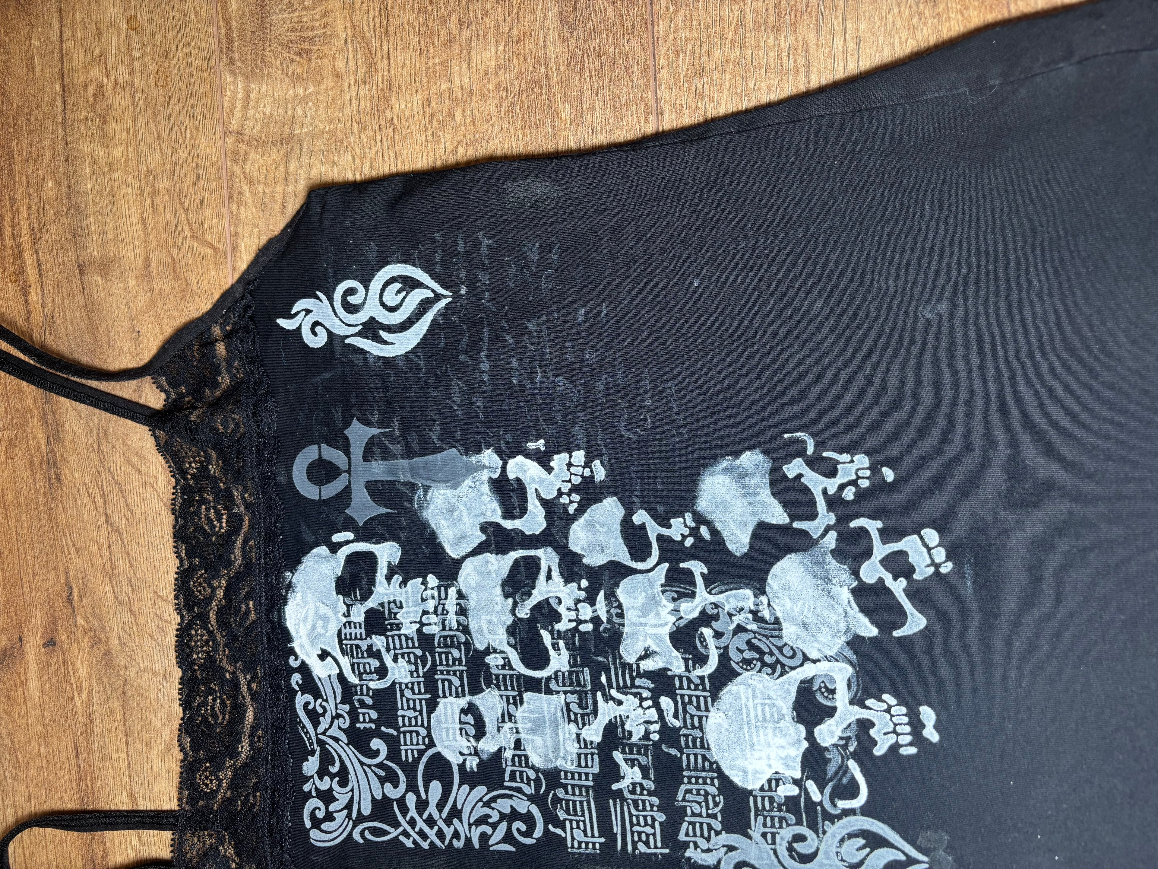 Laced black lady’s tank top with skull print