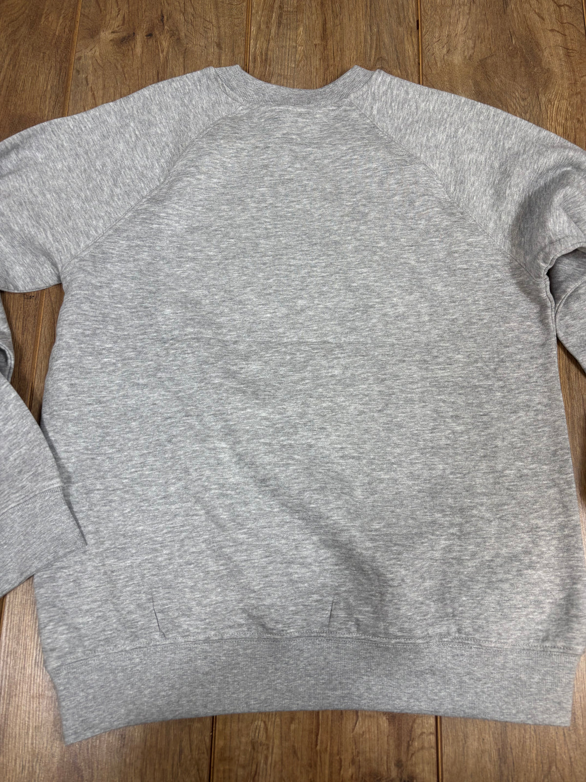 Upcycled gray jumper wendigo cryptid horror