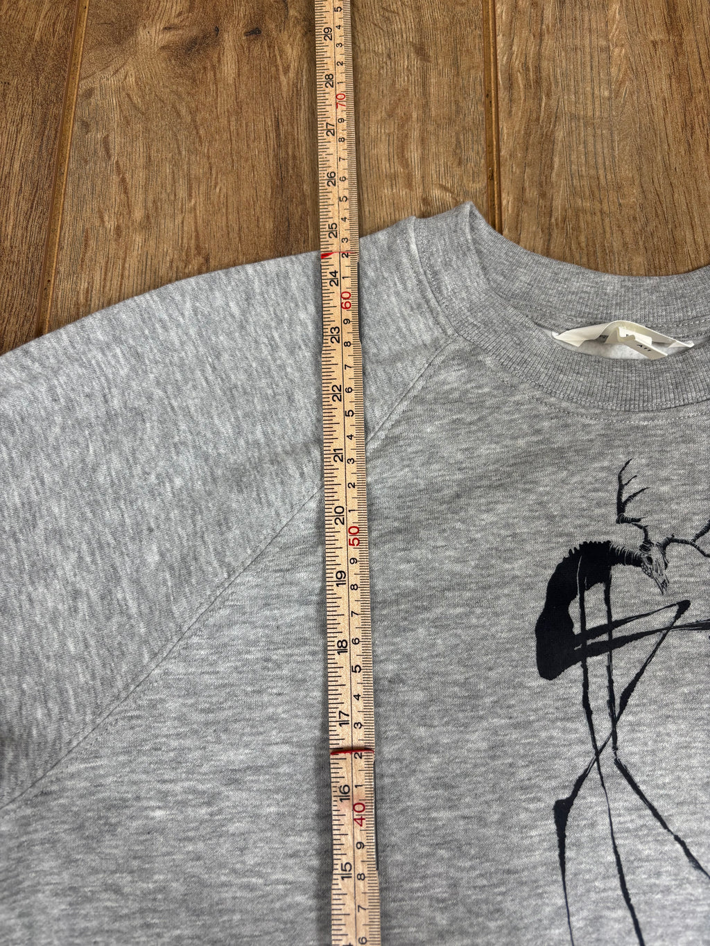Upcycled gray jumper wendigo cryptid horror