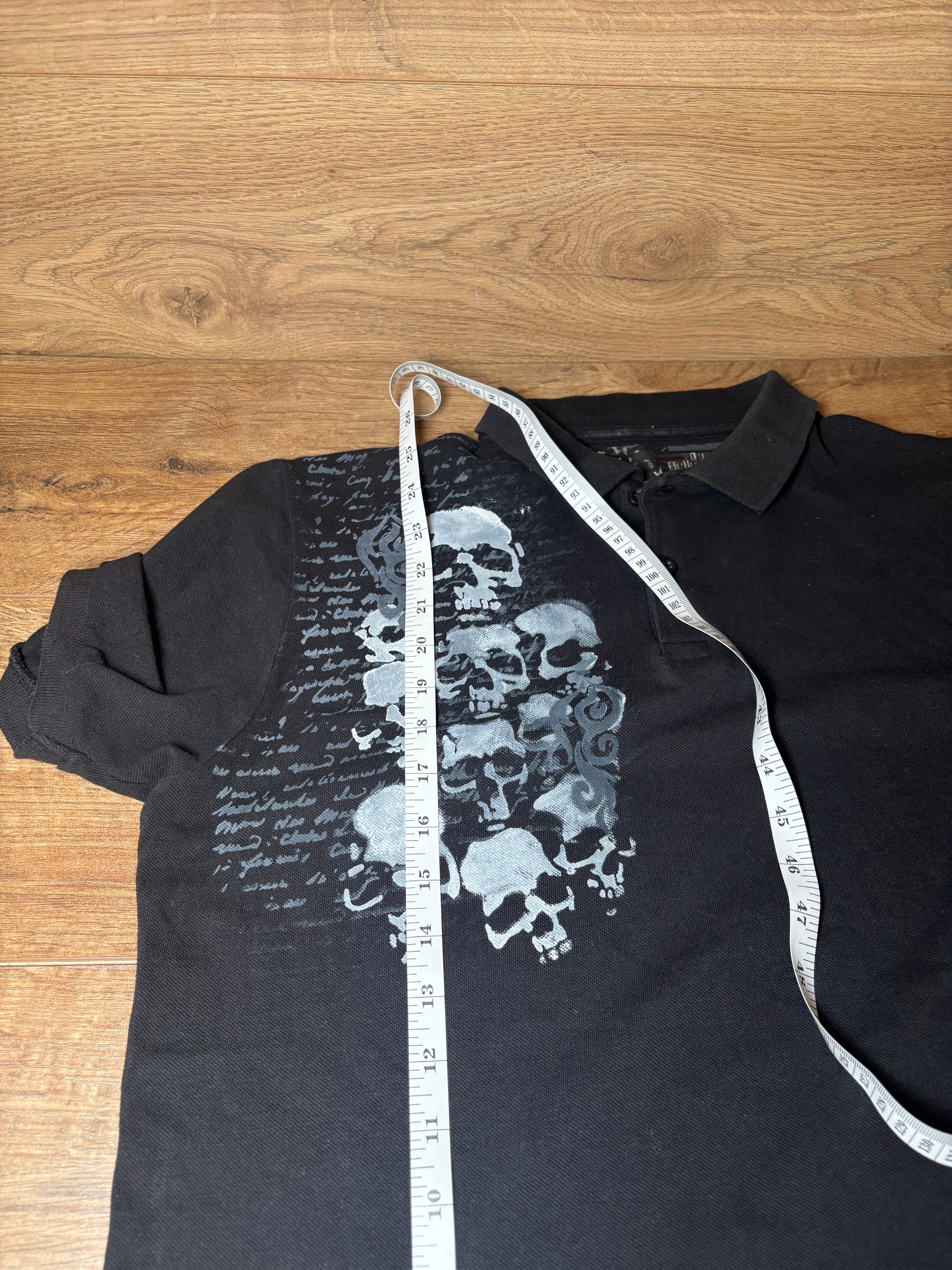 Skater style black and gray printed skull polo