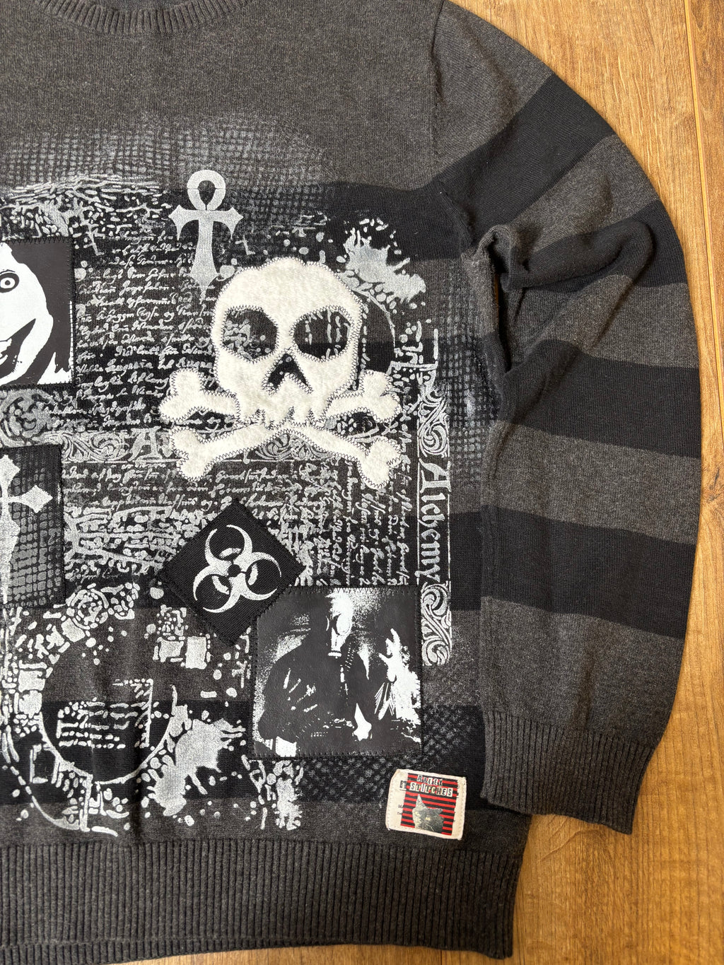 Black and gray striped sweater jumper upcycled with creepypasta patches and skulls