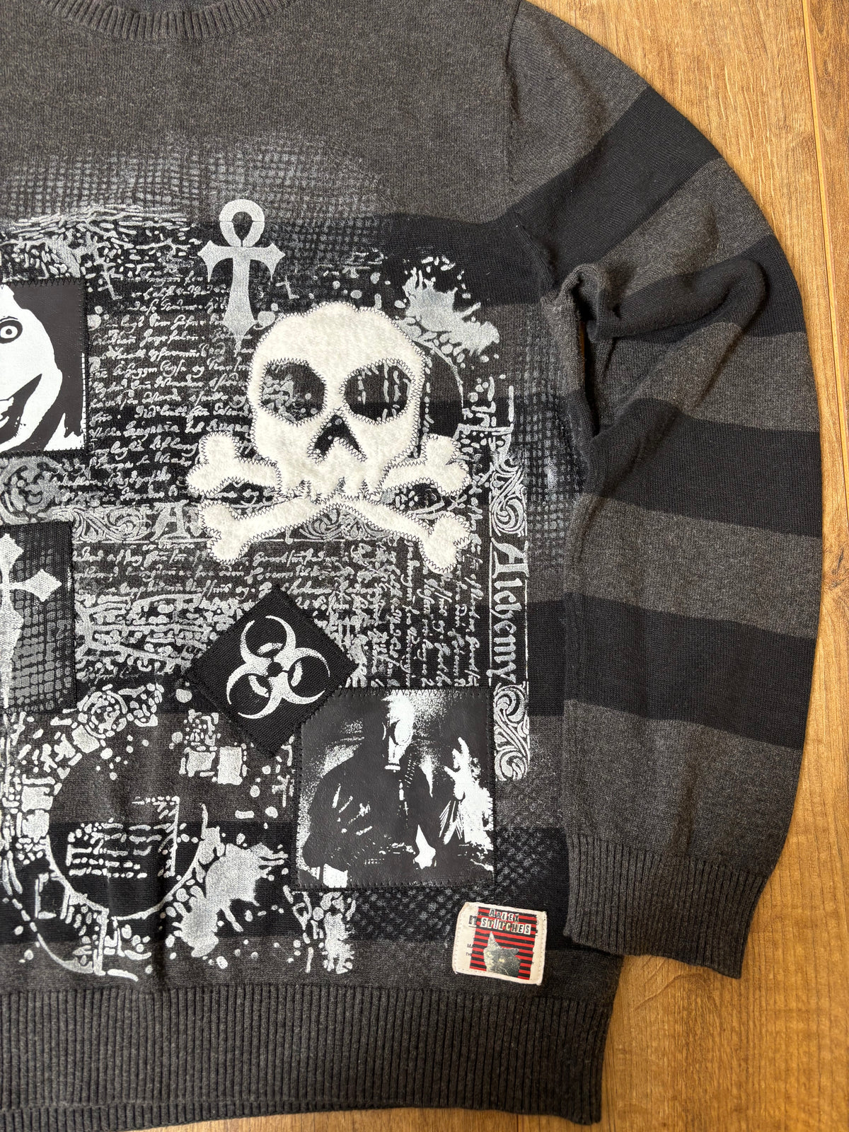 Black and gray striped sweater jumper upcycled with creepypasta patches and skulls
