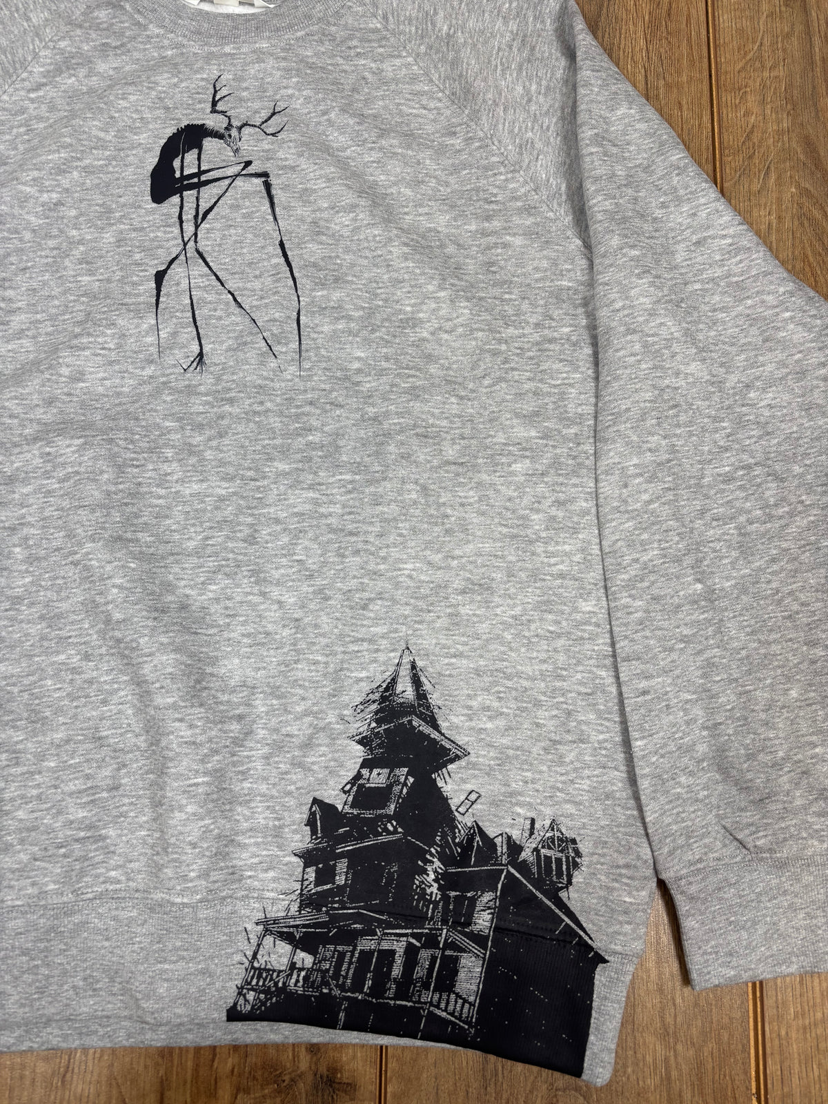 Upcycled gray jumper wendigo cryptid horror
