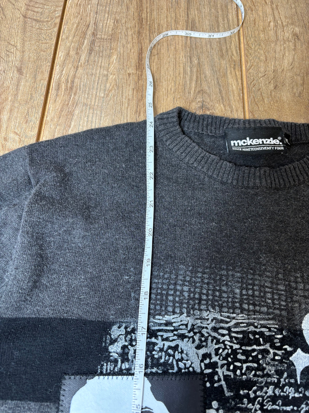 Black and gray striped sweater jumper upcycled with creepypasta patches and skulls