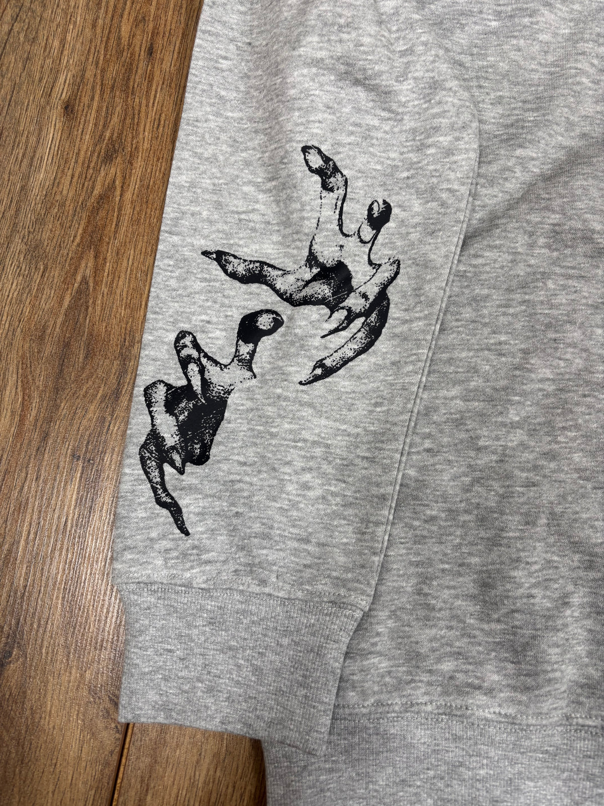 Upcycled gray jumper wendigo cryptid horror