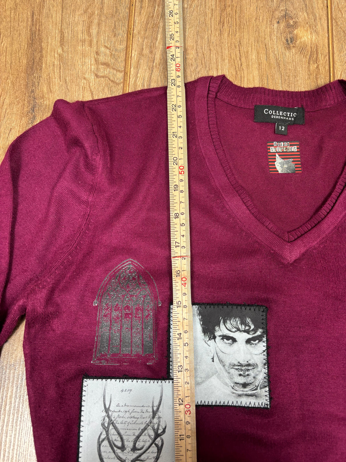 Upcycled royal purple v neck sweater with Hannibal print and patches