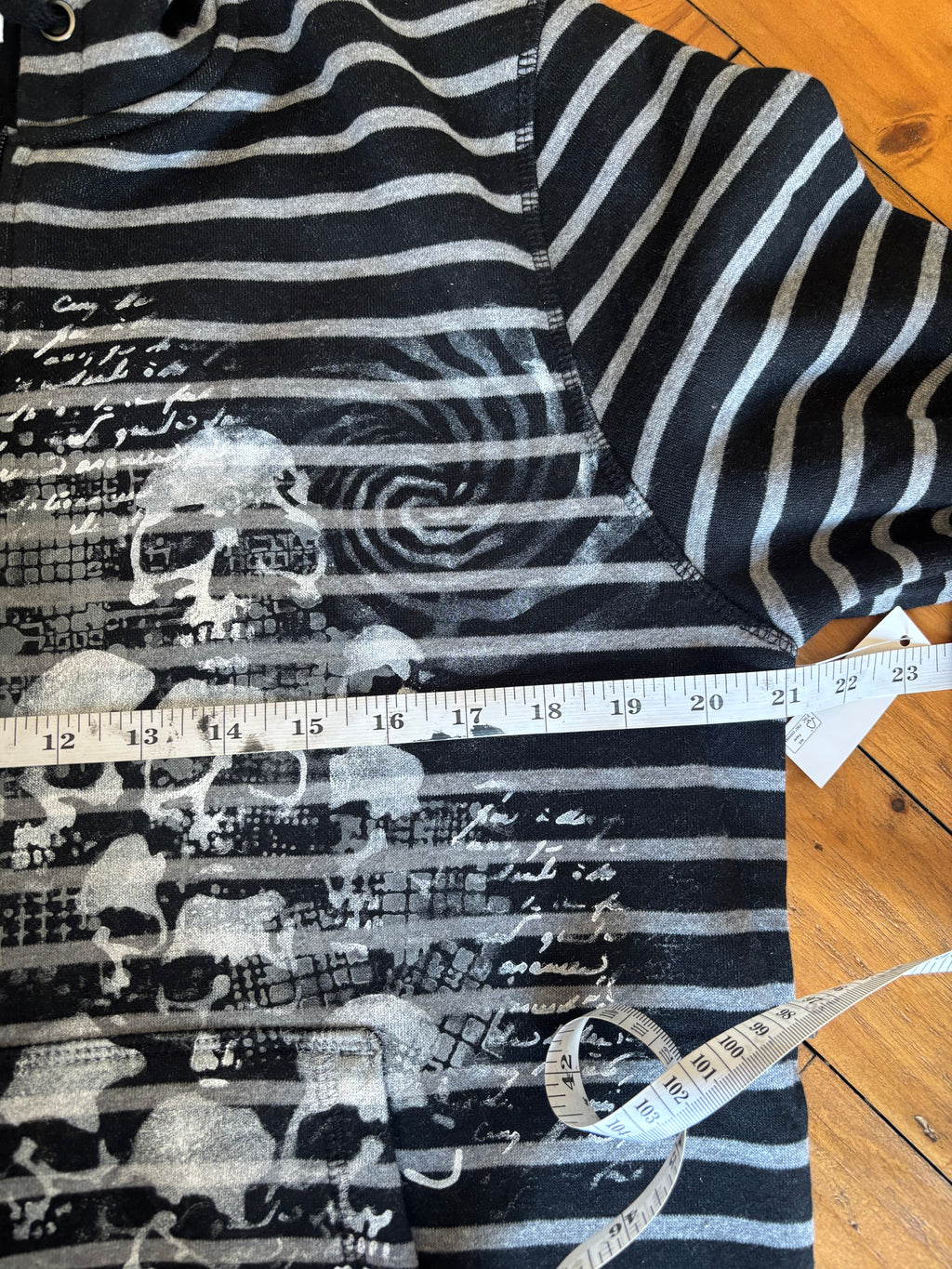 Donnie Darko inspired black and gray zip up hoodie with skulls
