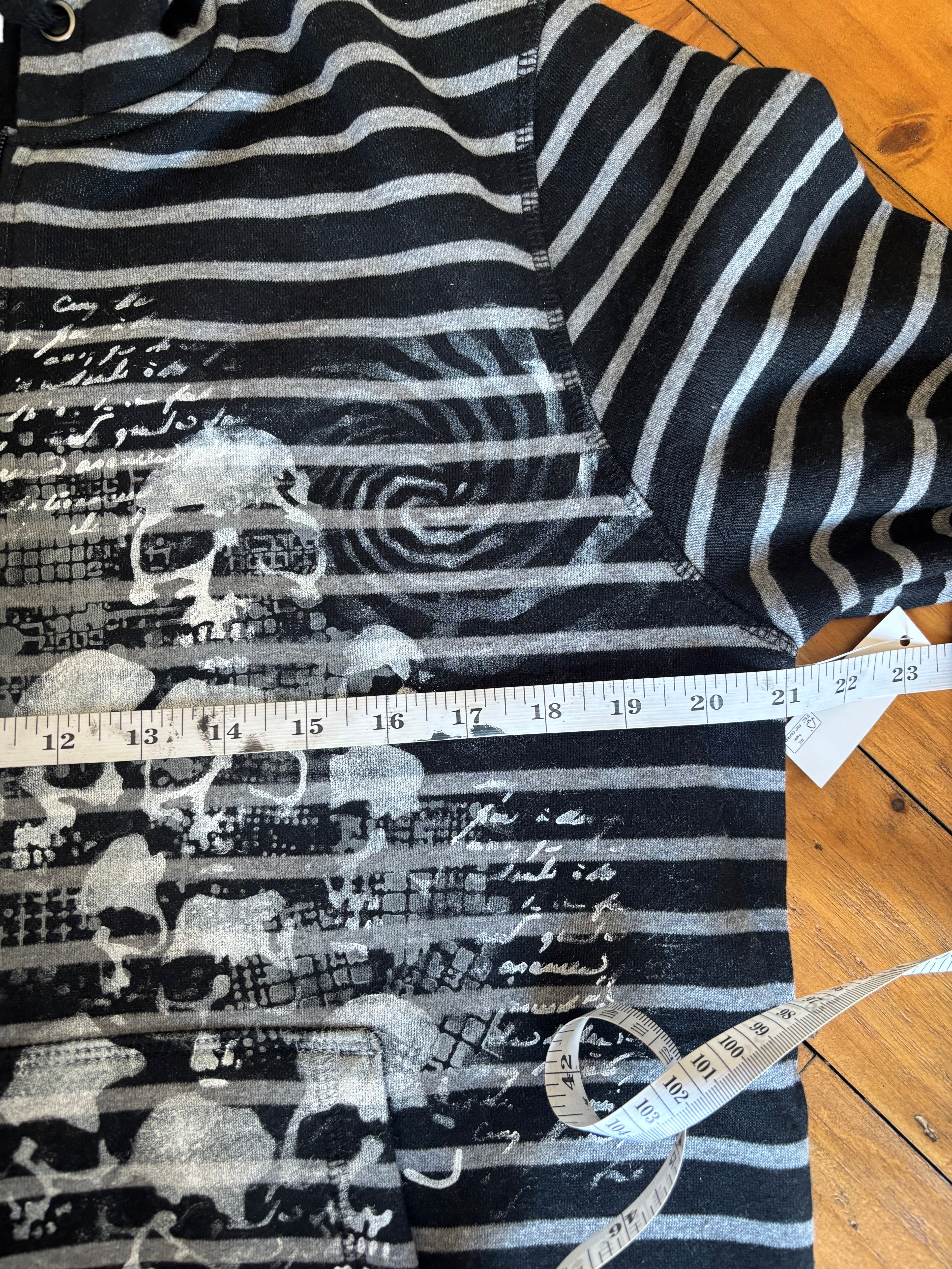 Donnie Darko inspired black and gray zip up hoodie with skulls