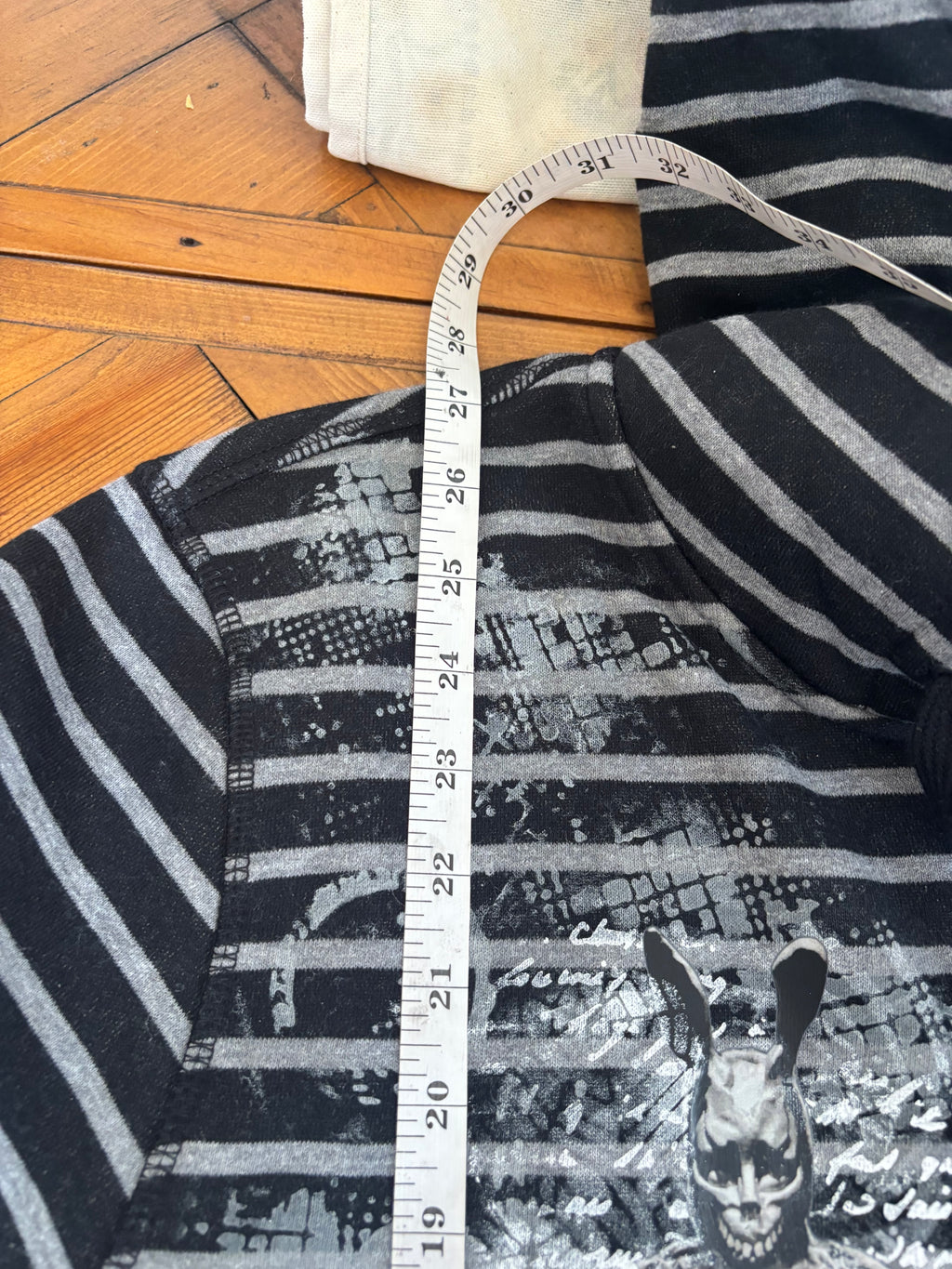 Donnie Darko inspired black and gray zip up hoodie with skulls